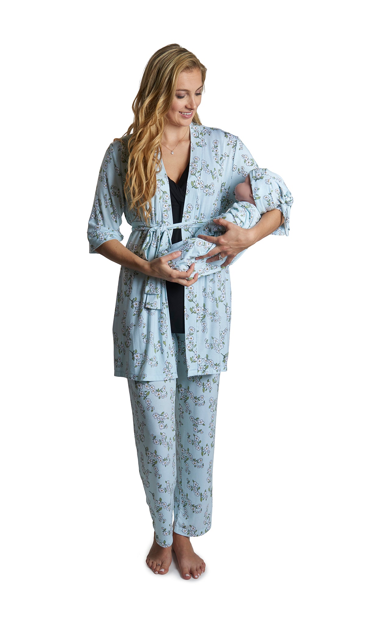 Baby's Breath Analise 5-Piece Set. Woman wearing 3/4 sleeve robe, tank top and pant while holding a baby wearing baby gown and knotted baby hat.