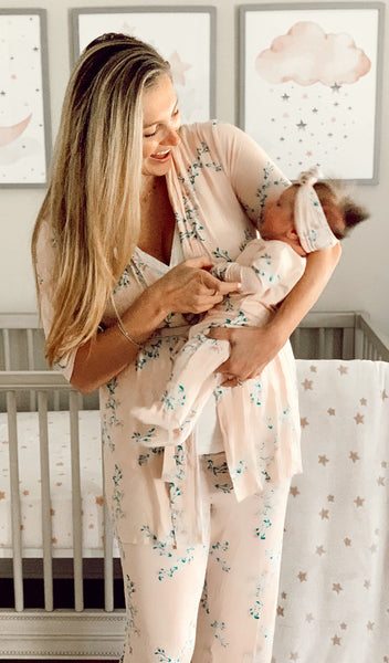 Lily Analise 3-Piece Set worn by woman while holding her baby in matching footie.