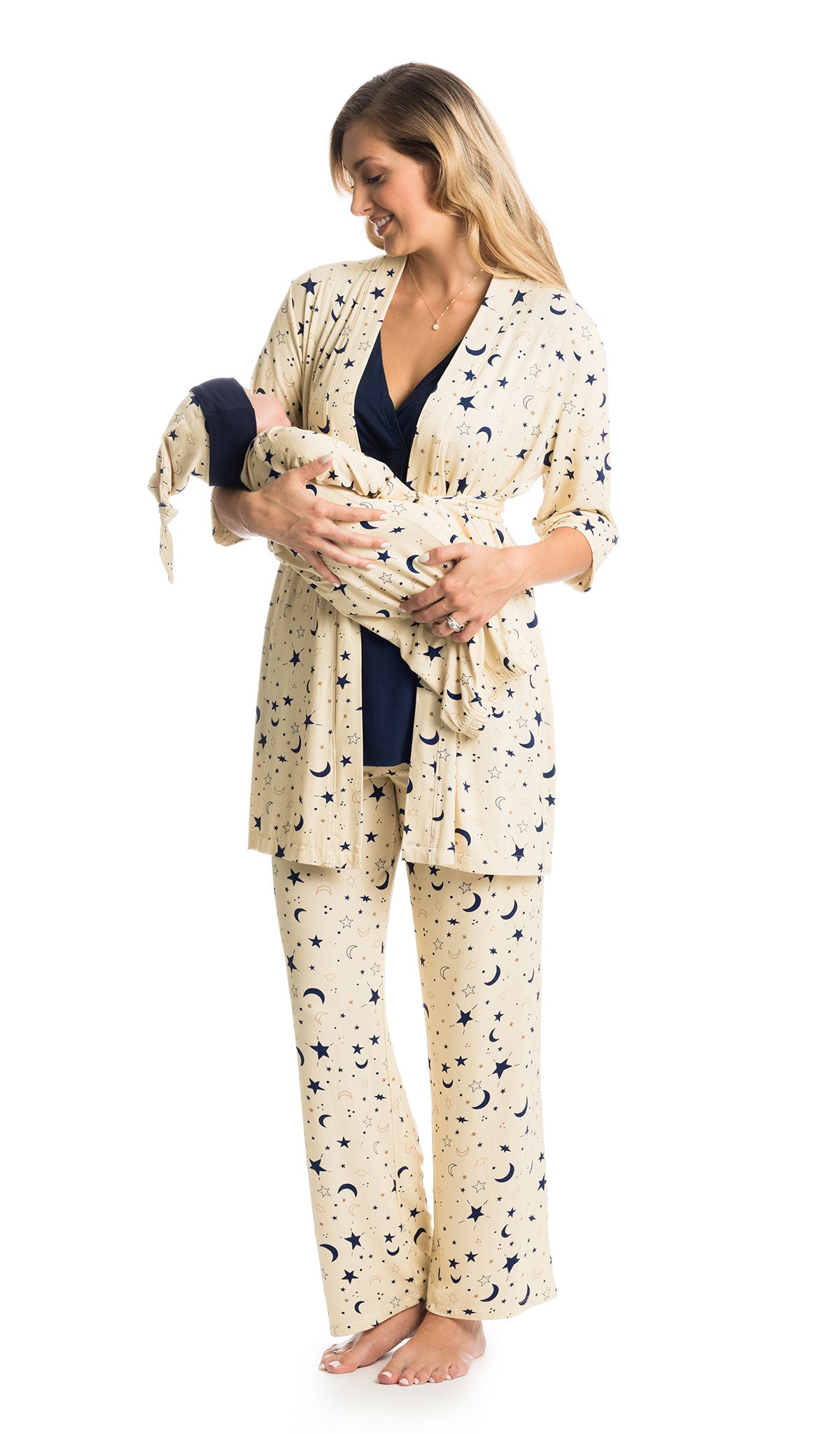 Twinkle Analise 5-Piece Set. Woman wearing 3/4 sleeve robe, tank top and pant while holding a baby wearing baby gown and knotted baby hat.