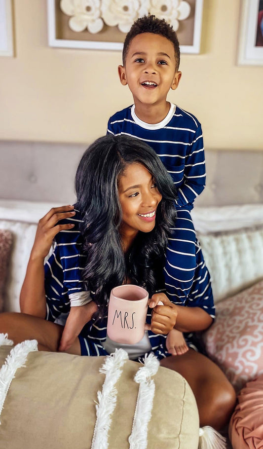 Navy Emerson Kids 2-Piece Pant PJ, woman wearing robe, tank top and short holding mug with boy sitting on her shoulders wearing matching Emerson.