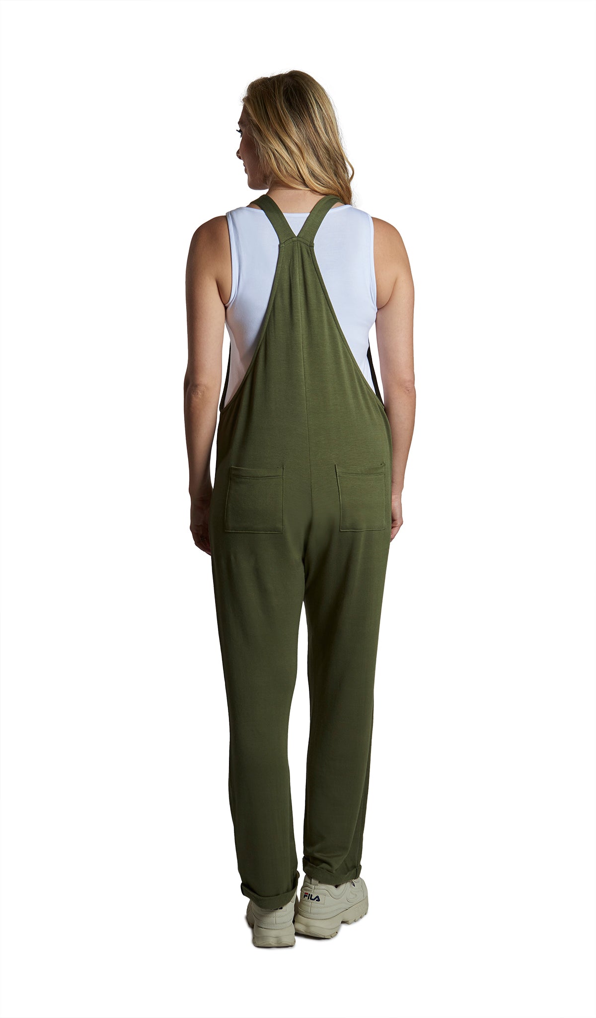 French Terry Olive Natalie Overall. Back shot image of woman wearing short sleeve tee under Natalie overall with two back pockets.