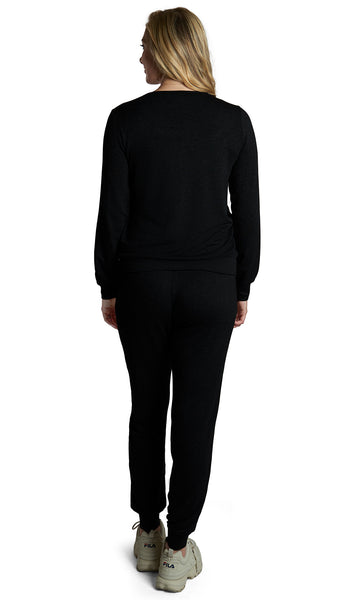 French Terry Black Whitney 2-Piece back view on figure showing long sleeve top and long pant with cuff hem.