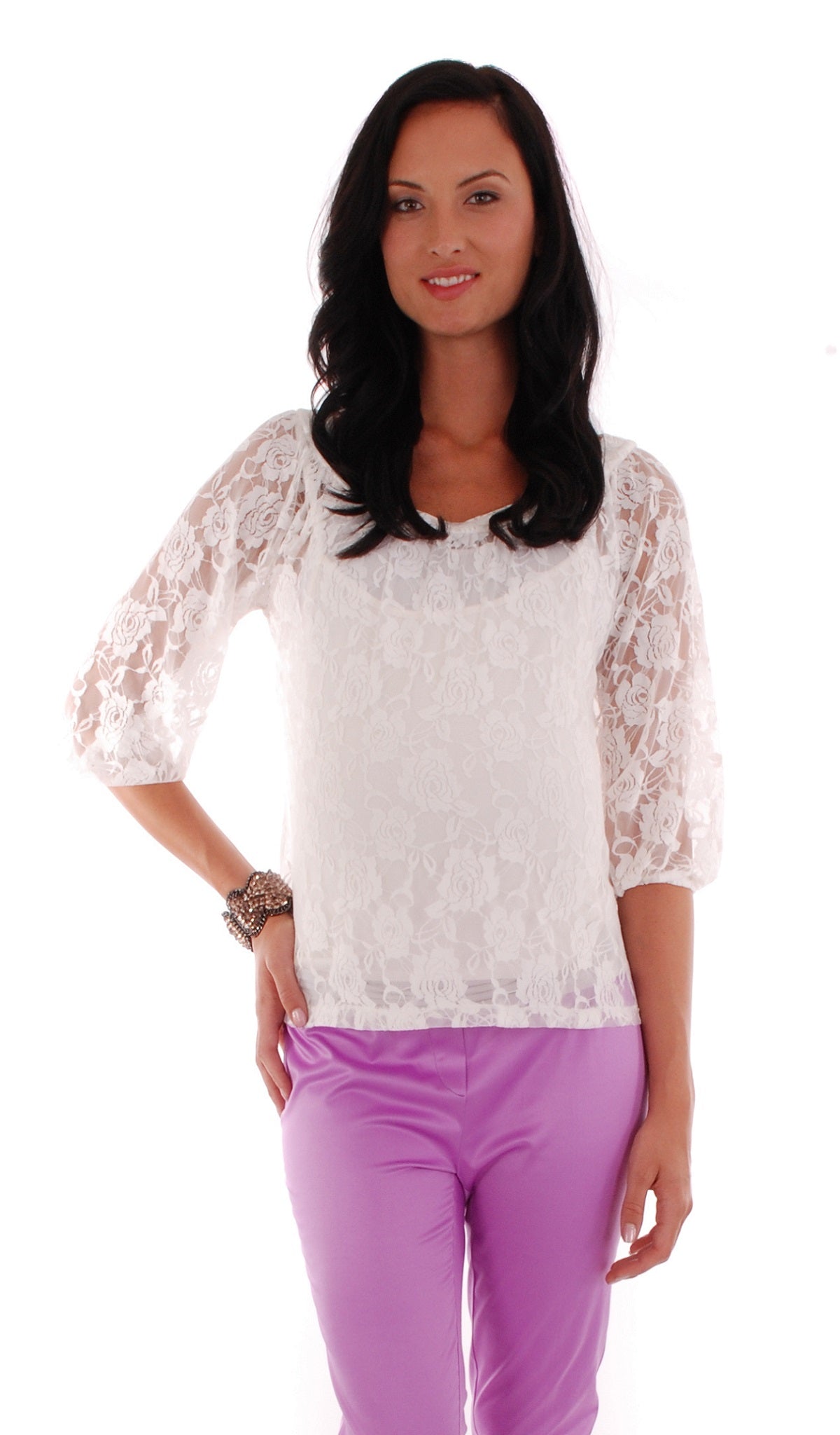 Ivory Drew lace top worn by pregnant woman with lavender pants.