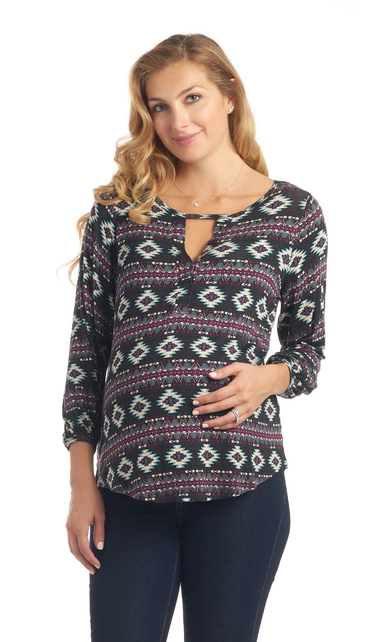 Aztec Purple Lila top worn by pregnant woman with one hand on her belly.