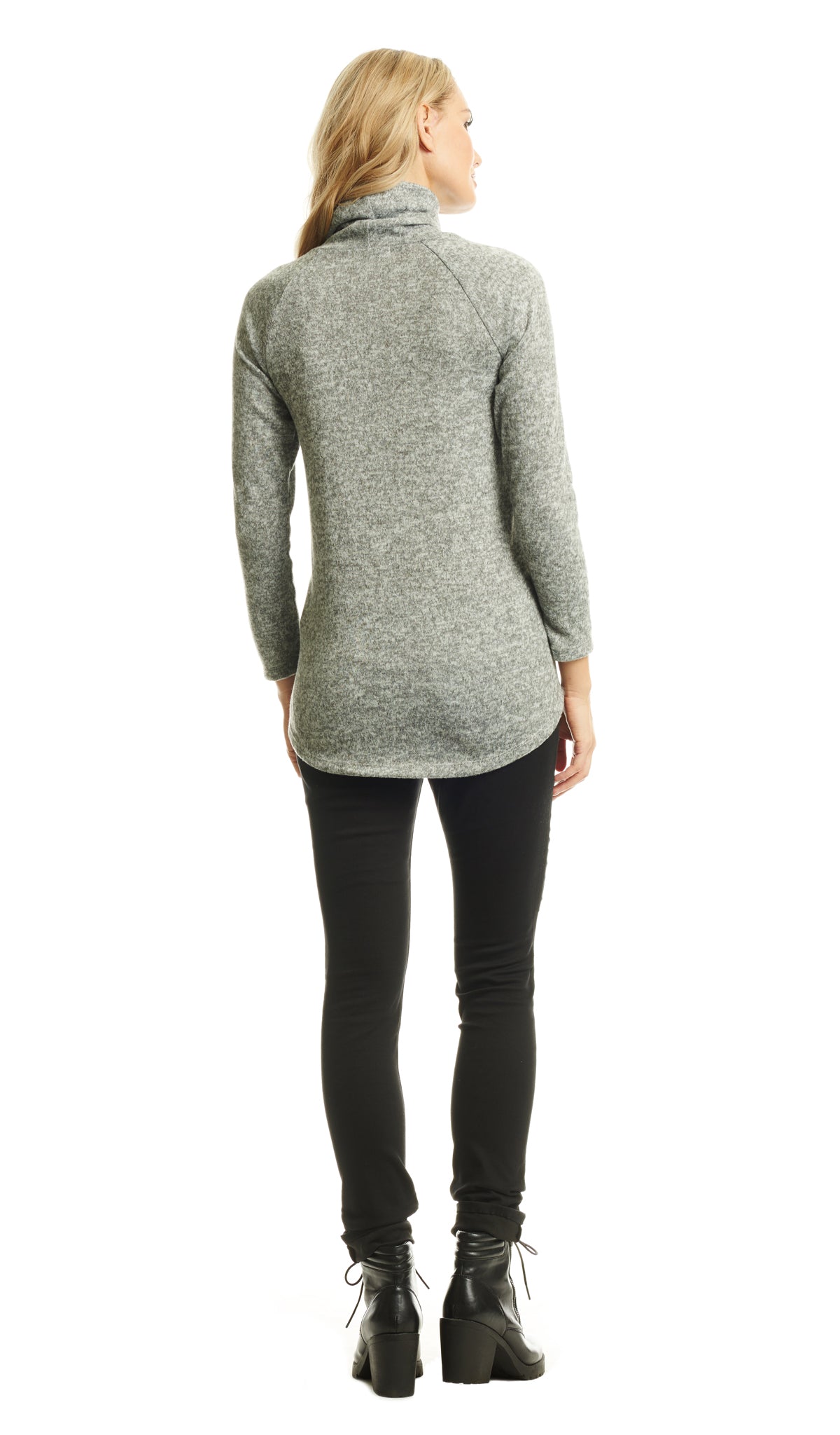 Heather Grey Teresa Sweater. Back shot of woman wearing Teresa Sweater with black pant and booties.